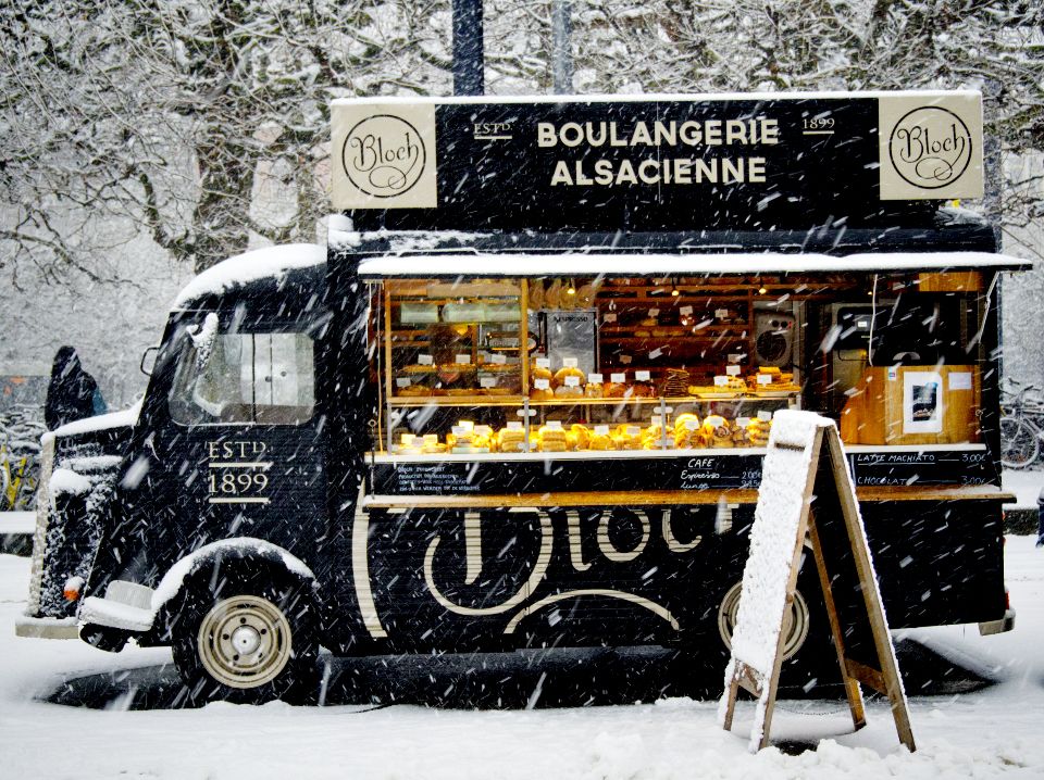 mobile boulangerie with baked bread parked on a snowy road