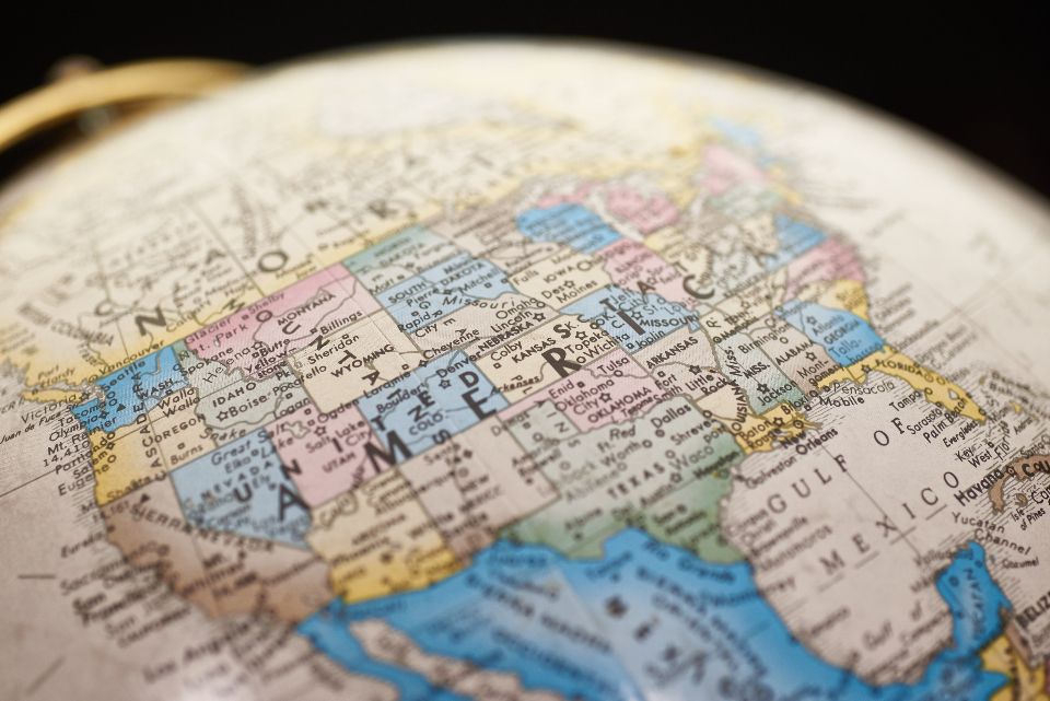 a globe showing a map of Canada, the United States of America and Mexico